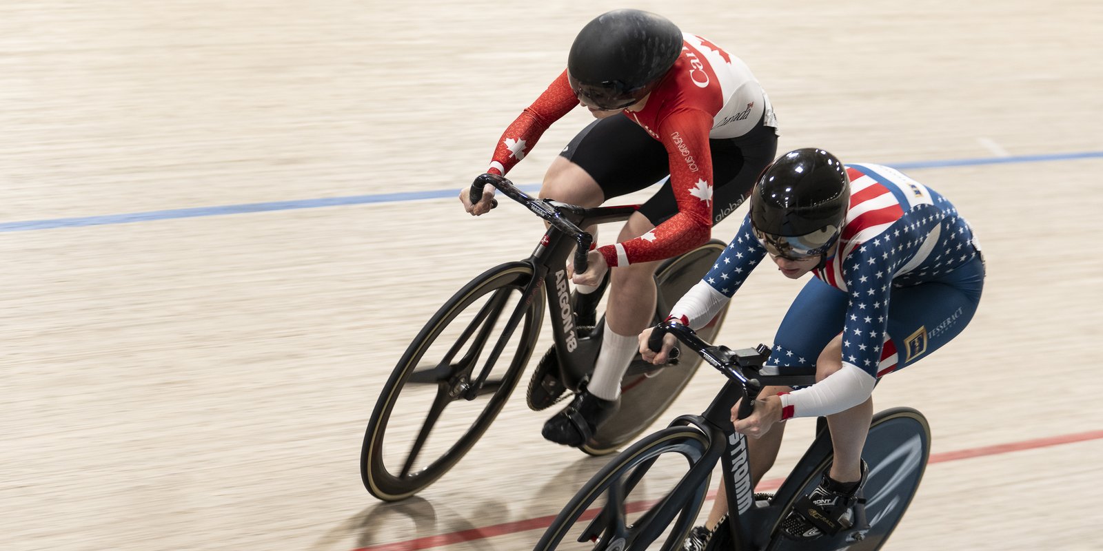 McKenna and another cyclist on the track at Bromont, McKenna in the sprinters lane